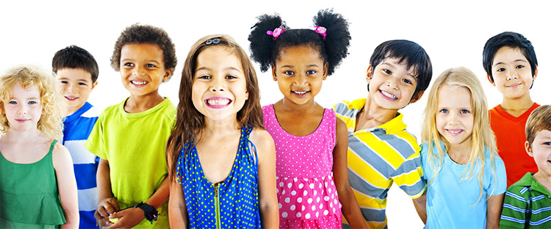 The image shows a diverse group of children posing together with smiles, displaying a range of skin tones and attire.